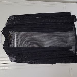 Dark blue cardigan with a cool herringbone pattern throughout the entire piece.